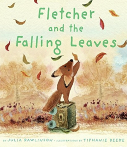 image shows a fox catching leaves on the cover of a book