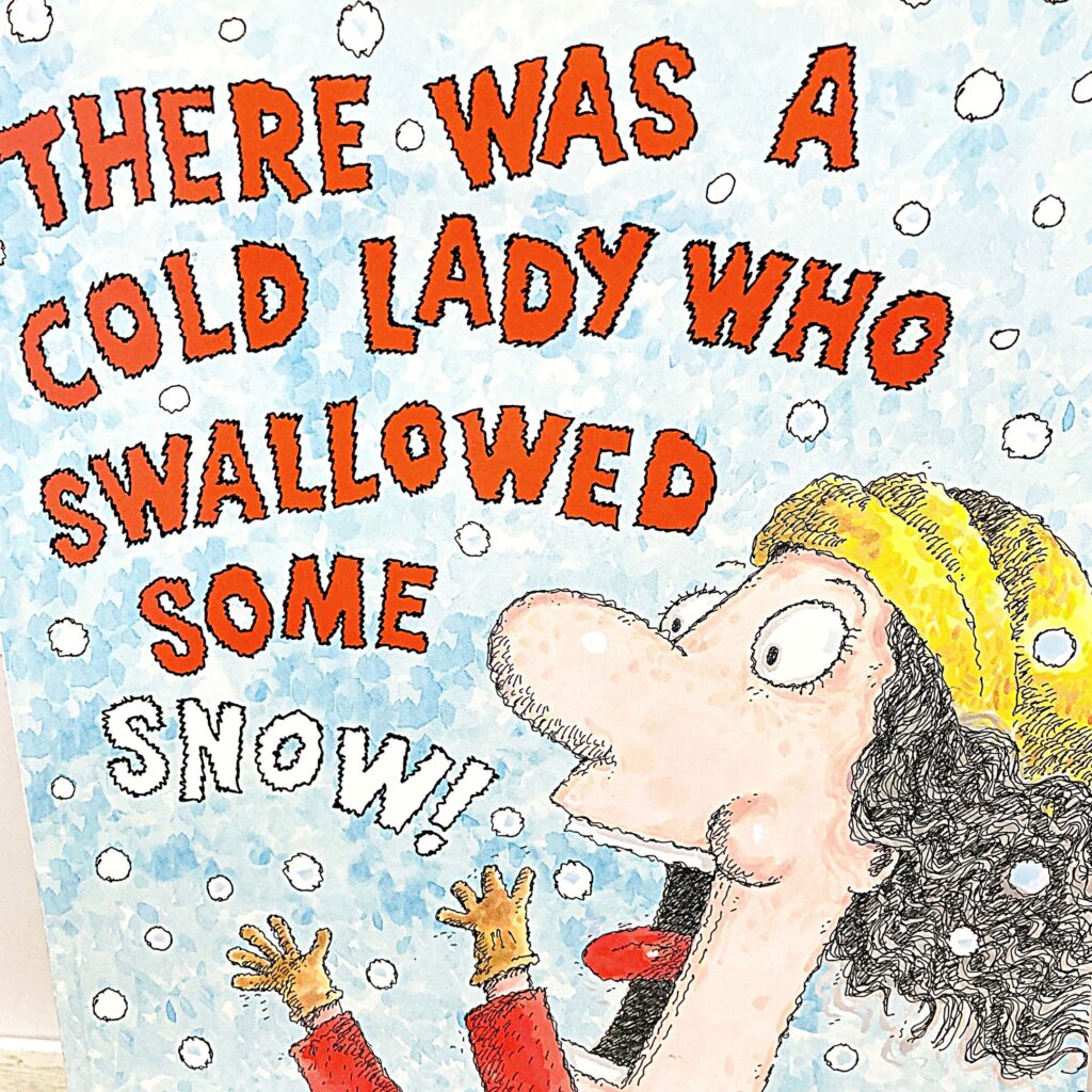 Image shows the cover of the book with an old lady catching snowflakes on her tongue