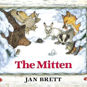 The Cover of the Mitten shows many forest animals looking at a mitten in the snow