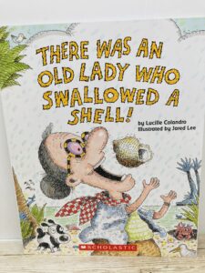 Images shows an old lading eating a shell (book cover)