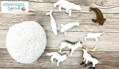 Image shows toy arctic animals and a snowball of play foam